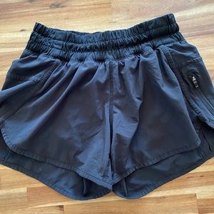 Black Lululemon hotty hot shorts, excellent used condition. Tear tag is missing.